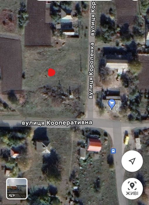 Продам хорошу рівну земельну ділянку 0,24 га в с.Жуки,вул.Короленка 2а