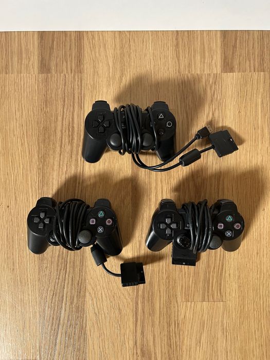 Mega Pack PS2 (Consola+ 3 Comandos+ 15 Jogos+ 2 Microfones+ 32MB Card)