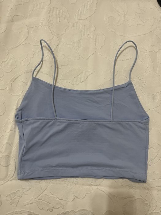Top azul claro em bom estado