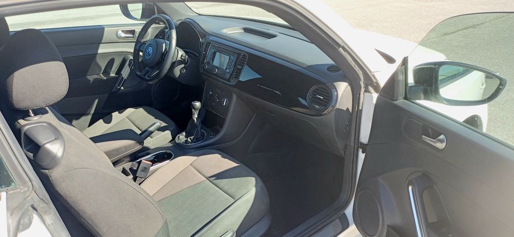 VW Beetle coupe TSI troca retoma