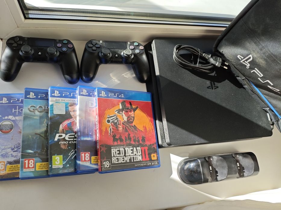 PS4 slim 500+2геймпада+док станція+диски з іграми та сумка!