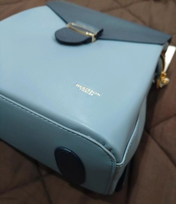 Mochila azul nova