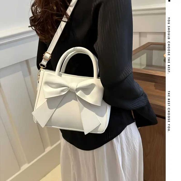 Элегантная женская сумка через плечо с бантом