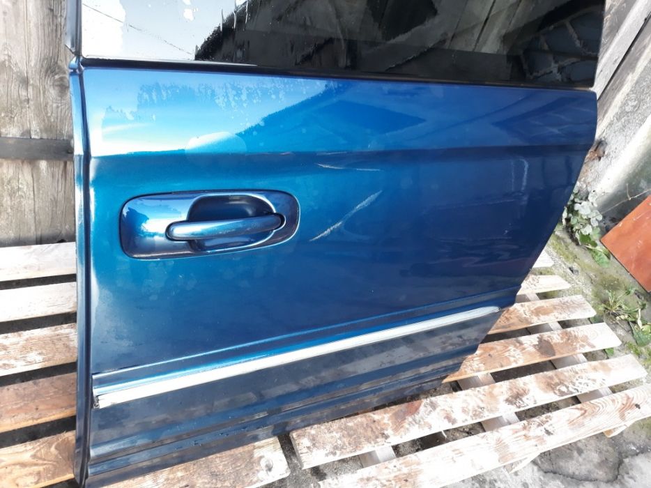 Drzwi lewy tył voyager IV 06r granat