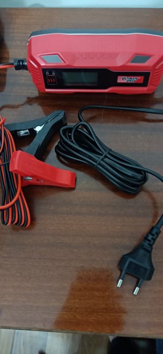 Carregador de baterias de 6/12 Volts.novo
