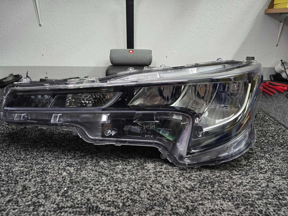 Farol Toyota Corolla E21
