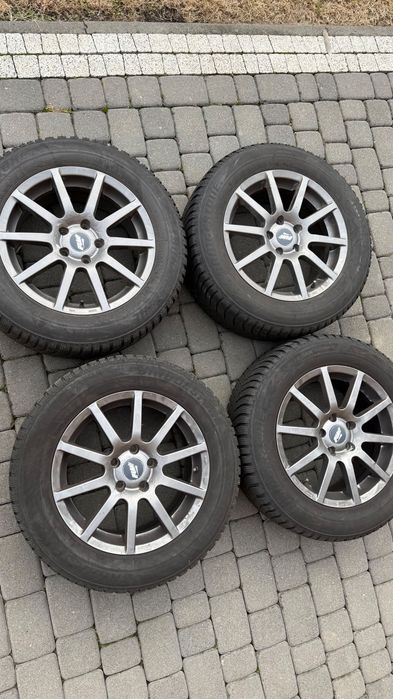 Felgi aluminiowe 16" 5x110 z oponami zimowymi Bridgestone 215/60/16