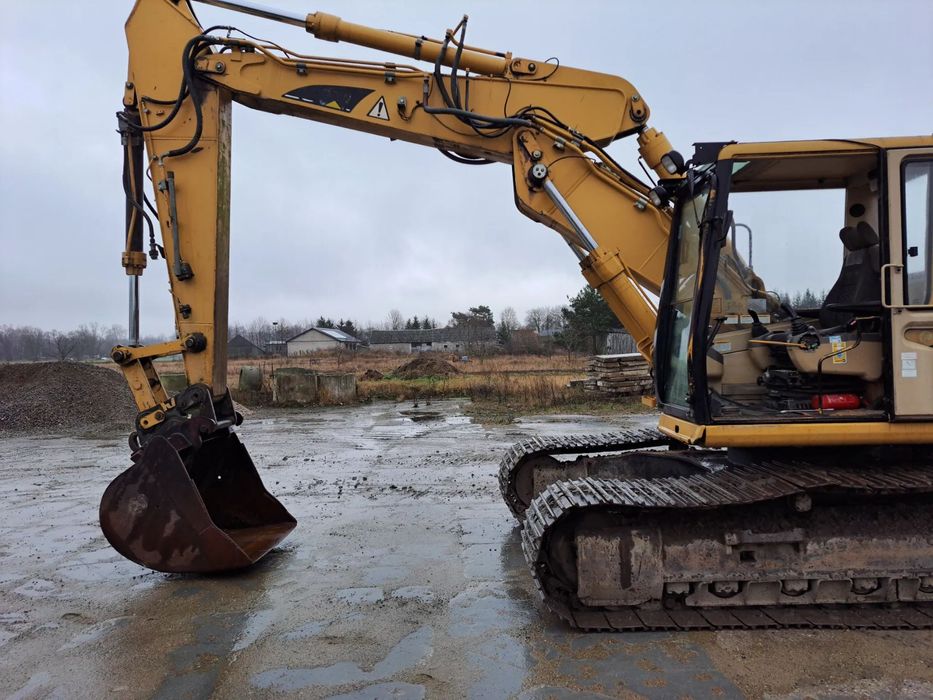 Caterpillar 318BL  Koparka Caterpillar 318BL,w pełni sprawna i gotowa do pracy