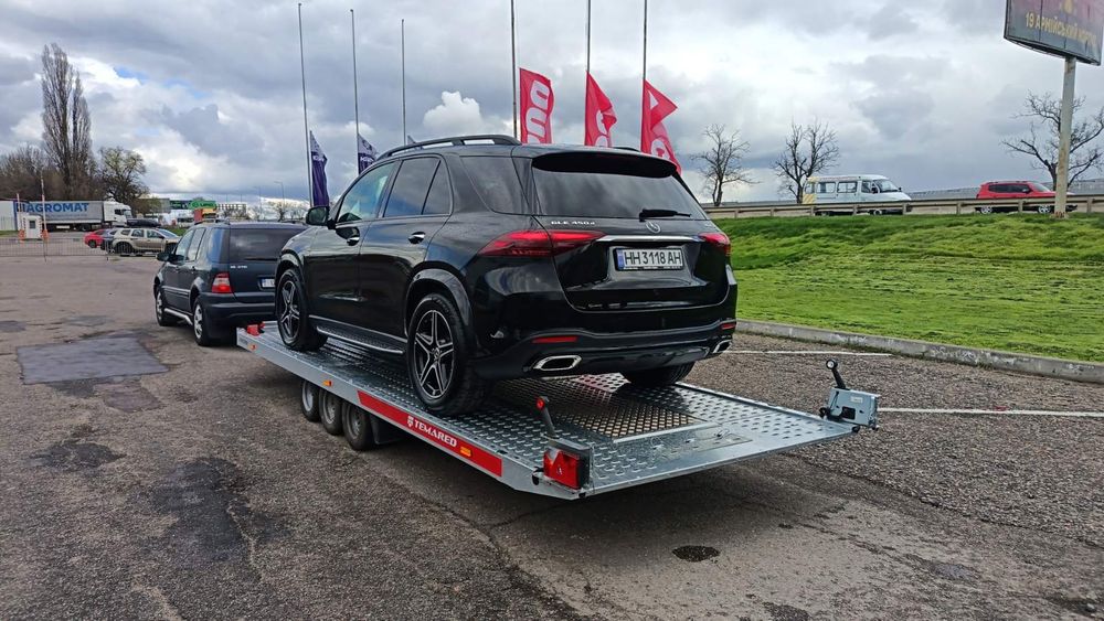 Доставка авто перевозка авто в Україну Автовоз евакуатор лафет