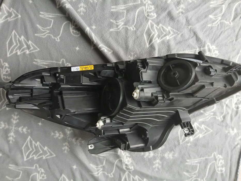 opel corsa e xenon przednia lewa lampa