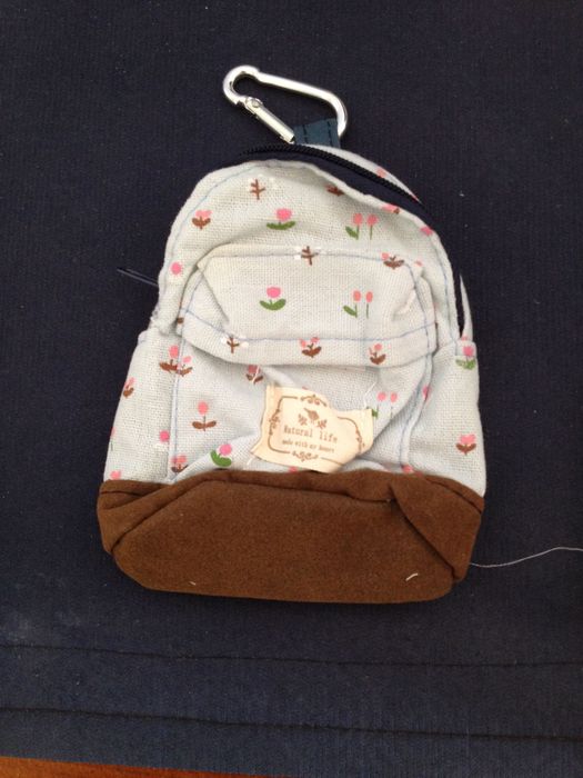 Mini mochila em tecido - 1 cor à escolha