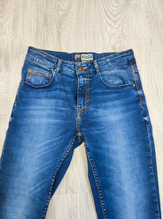 Spodnie jeans niebieskie gładkie wąskie rurki Raizzed XS