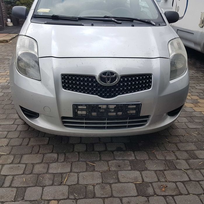 lampa reflektor toyota yaris II 2 08r P9 oryginał