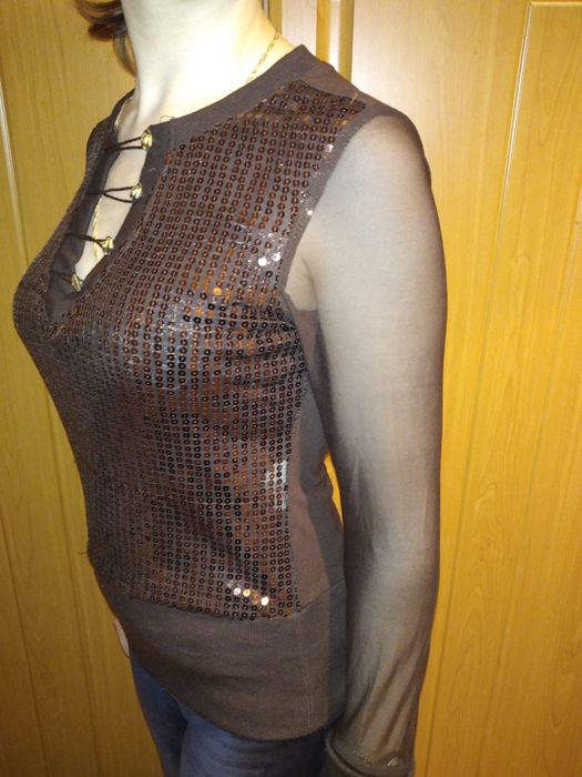 Святкова блискуча жіноча кофтинка