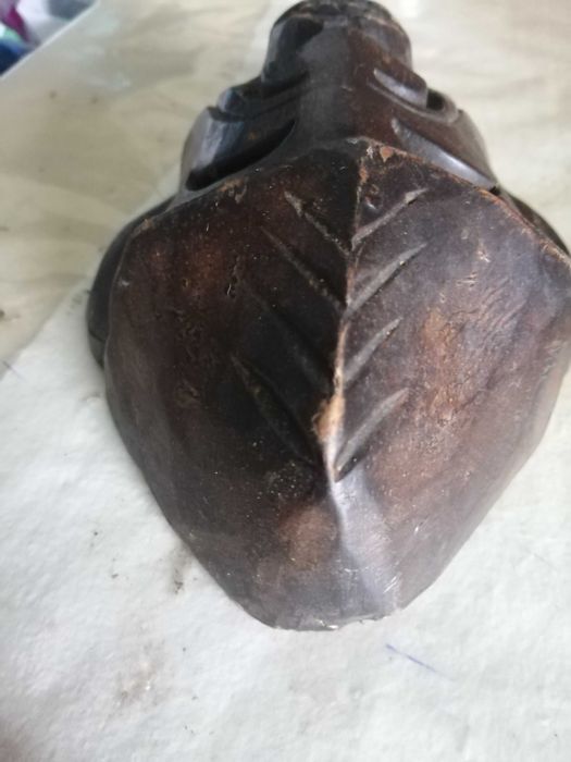 mascara de parede antiga em madeira