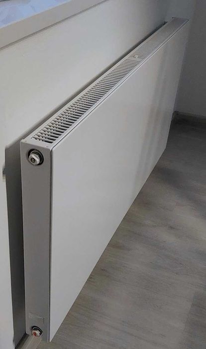 Grzejnik Purmo Plan Compact FC21s 550x1200, piękny gładki biały front.