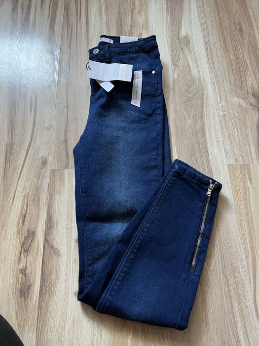 Nowe spodnie jeansy elastyczne damskie S