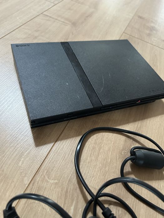Zestaw PlayStation 2 Slim (SCPH-75003) + 2 Oryginalne Pady Sony + 4 Gry