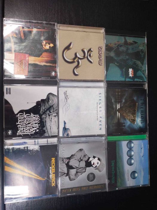 CD диски Зарубіжних рок-гуртів та виконавців,завод(нові)