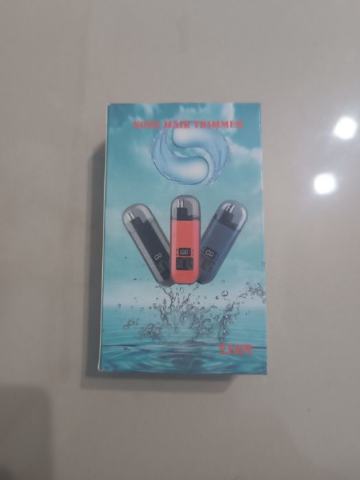 Акомуляторный триммер для волос в носу или ушах.