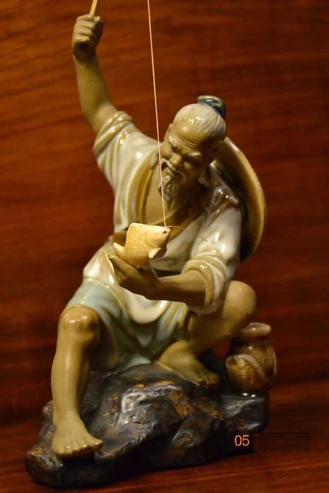 Figura de pescador chinês com peixe