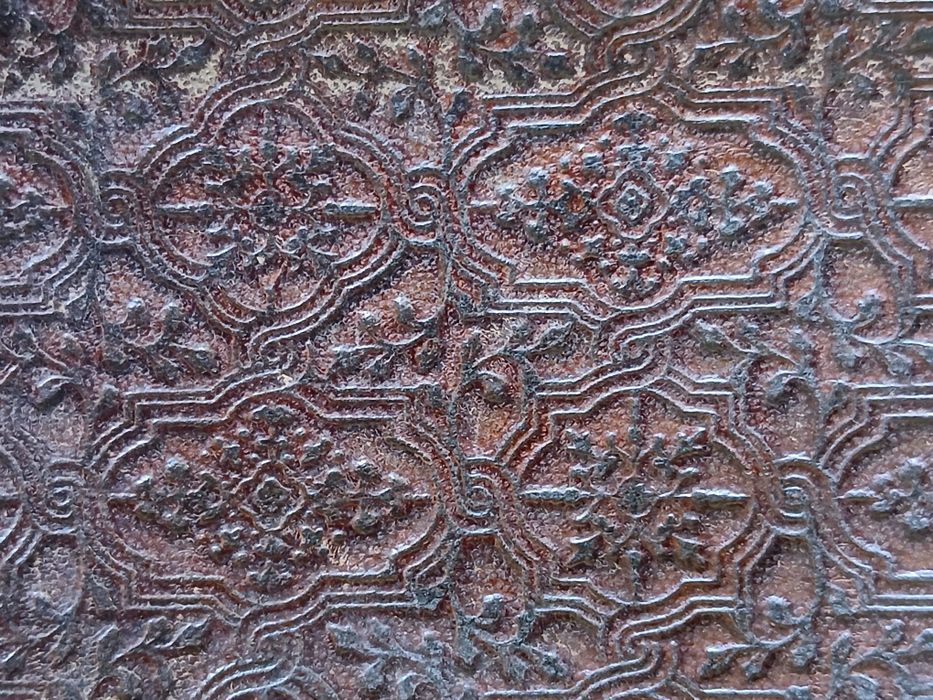 Capa de livro antiga em pele gravada