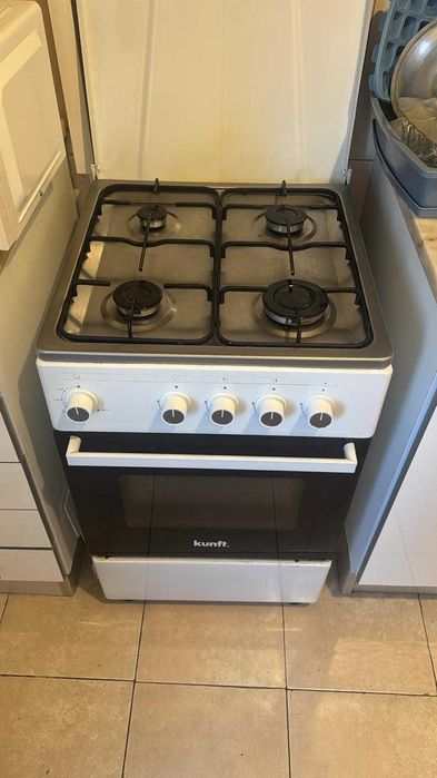 Fogão gás natural ou bilha.