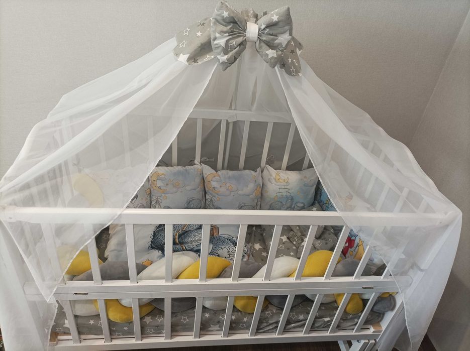 Дитяче ліжечко-маятник