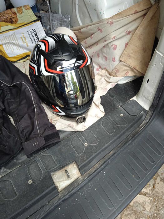 Capacete e casaco de Motard