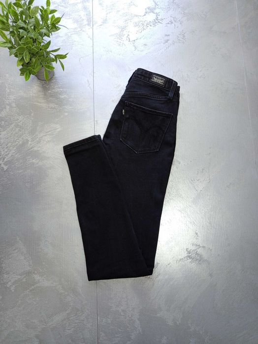 Damskie spodnie Levis W25 L30 XS