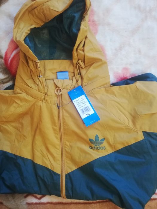 Олімпійки Adidas Originals і куртки весна-осінь The North Face