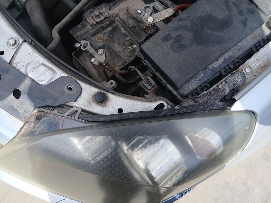 Ótica / farol esquerda OPEL Astra H Caravan (L35)