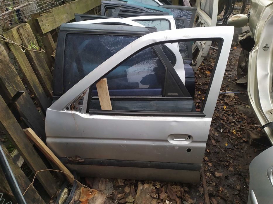 Дверка ліва перед Форд Ескорт Мк7 Escort Mk7