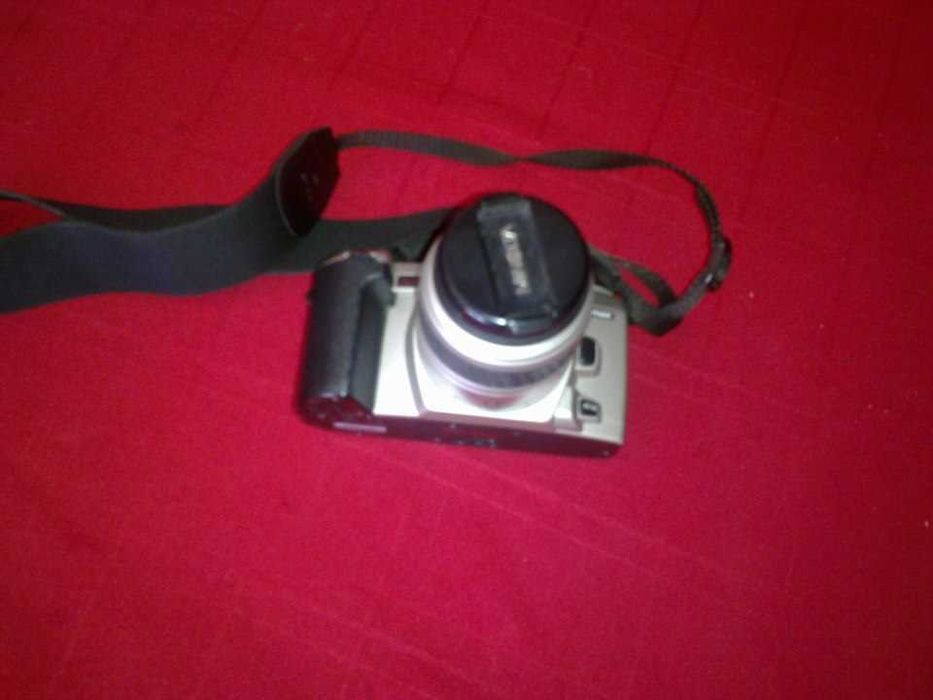 Minolta 404Si (analógica)