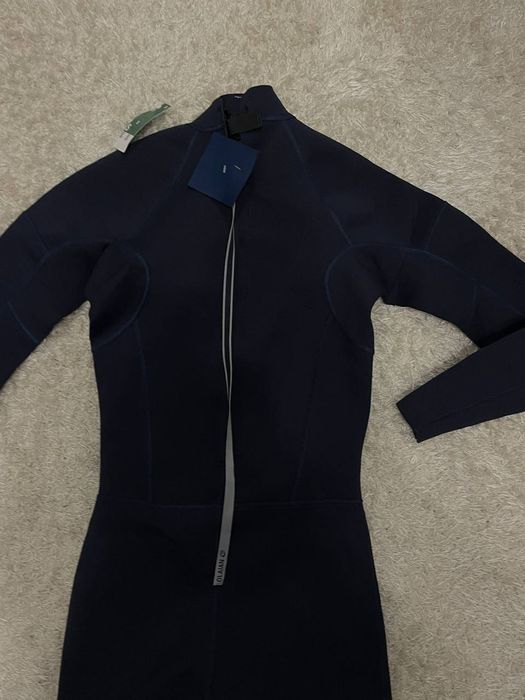 Гідрокостюм чоловічий SURF 100 для серфінгу неопрен 2/2 мм синій

Колі