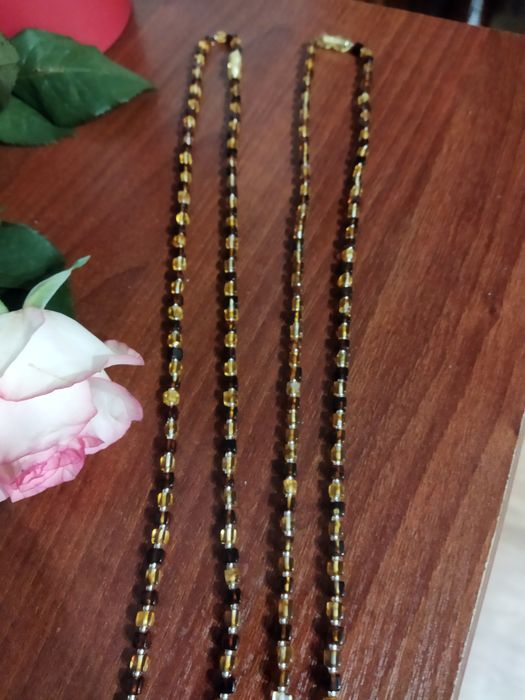 Буси з бурштину ,темні ,світлі