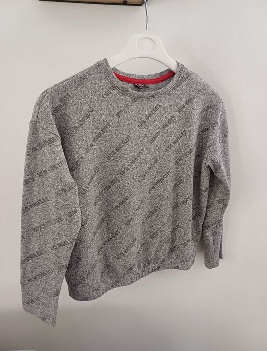 Sweterek dziewczęcy r.146/152