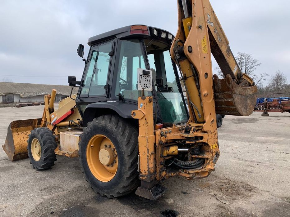 Case 580SM екскаватор навантажувач