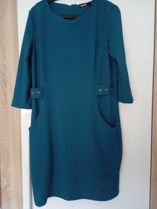 Niebieska  elegancka sukienka