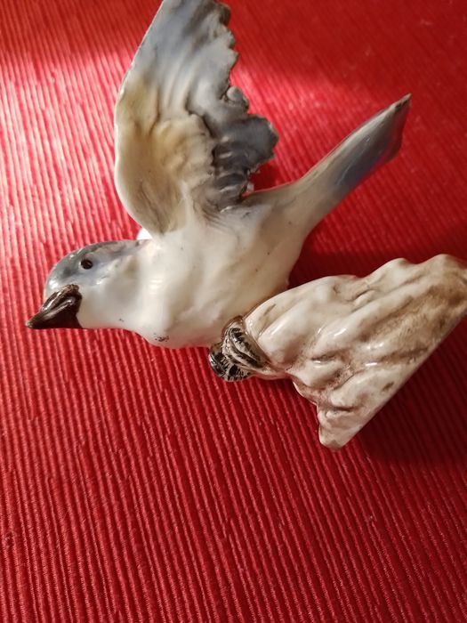 Passaro em porcelana vidrada