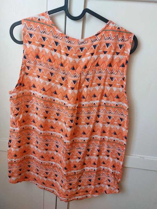 Top laranja
Bom estado