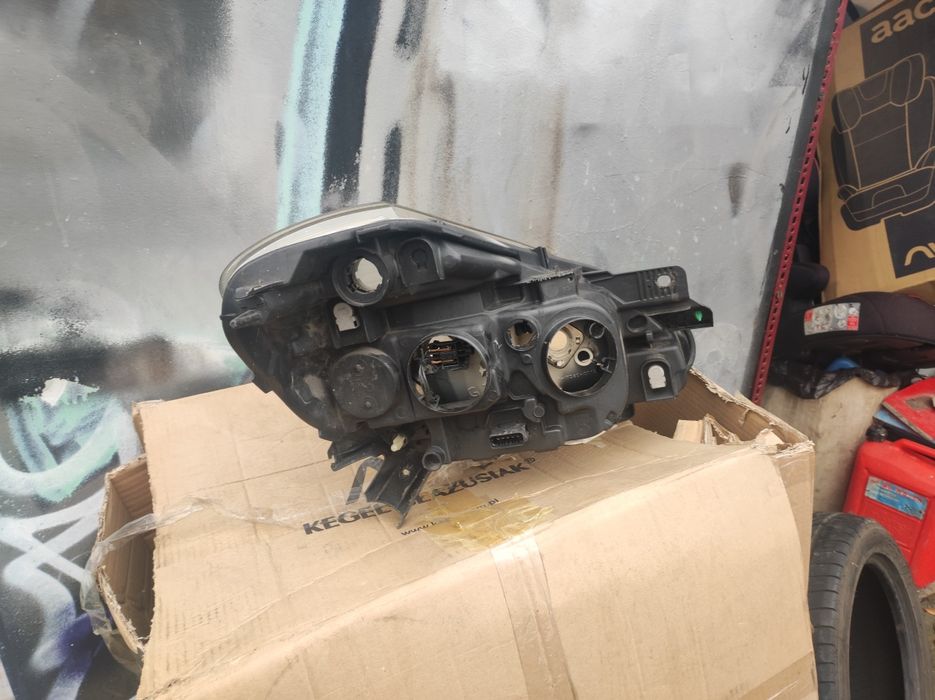 Lampa Clio 3 lift 09-12 lewa orginalna