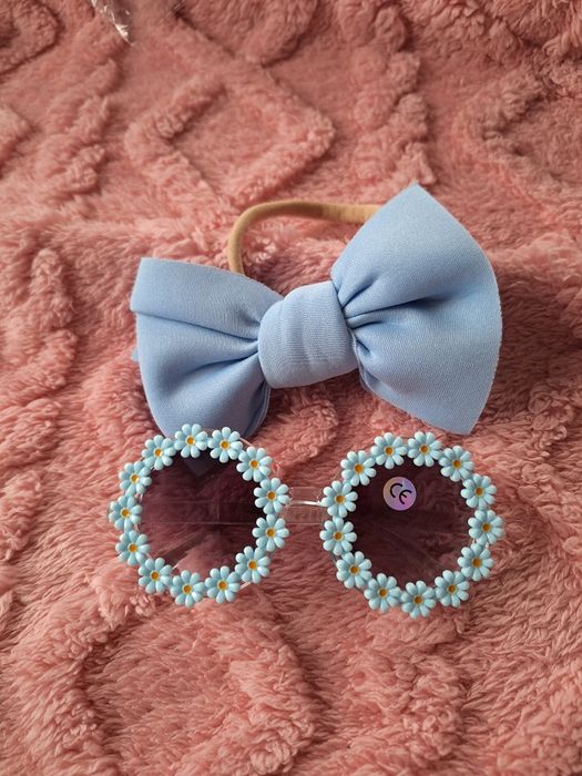 Nowe niebieskie dziecięce okulary przeciwsłoneczne dla dziecka dziewcz