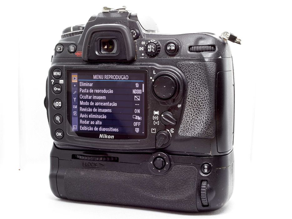 Nikon D300 + Lente Nikon DX 35mm 1.8G + Battery pack + flash + CFcards