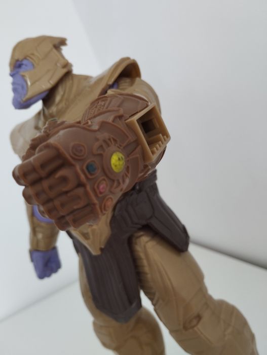 Thanos.                     .64409508954114123