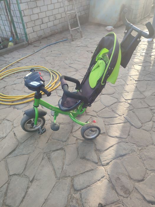 Велосипед трехколёсный с козырьком