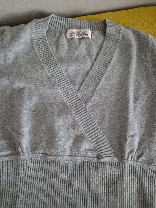 Sweterek damski .
