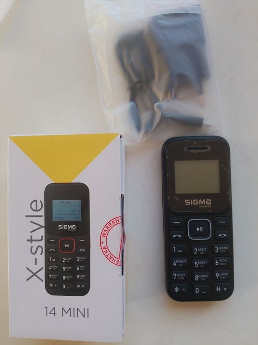 Телефон кнопочный коробка и зарядка  SIGMA фонарик очень яркий