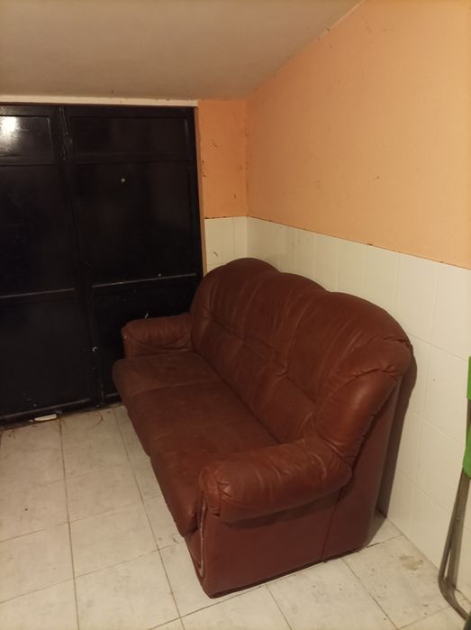 Sofá cama em couro