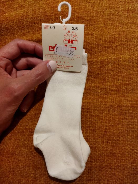Meias bebê com etiqueta
